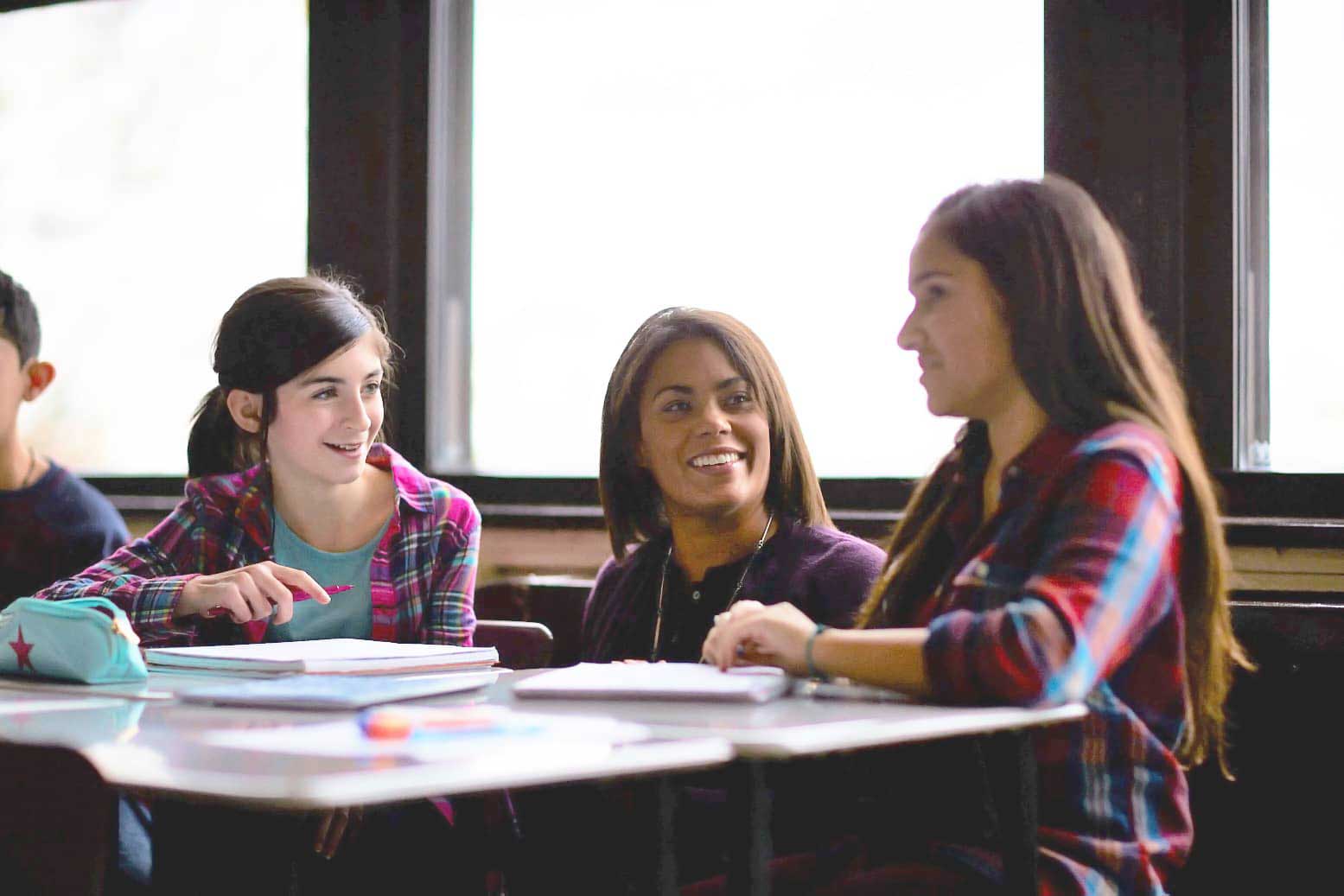 Three girls in classroom Three girls in classroom