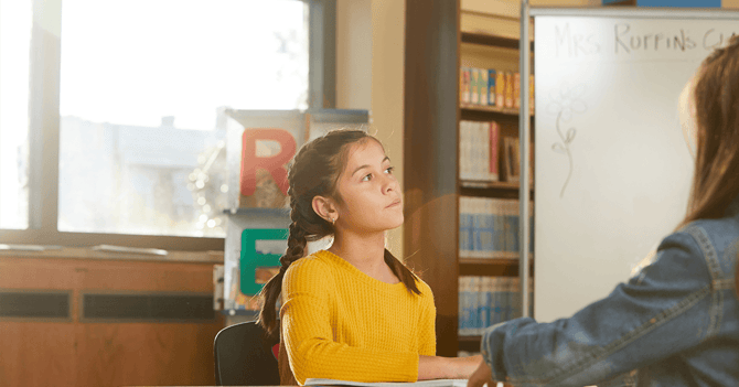Girl thinking in class