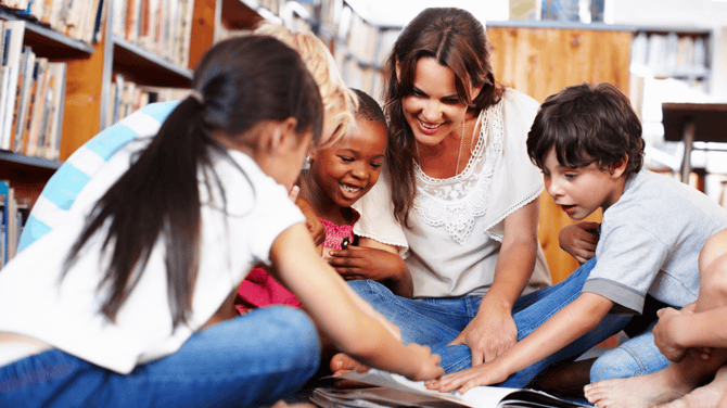 students and teacher in small group learning with geodes